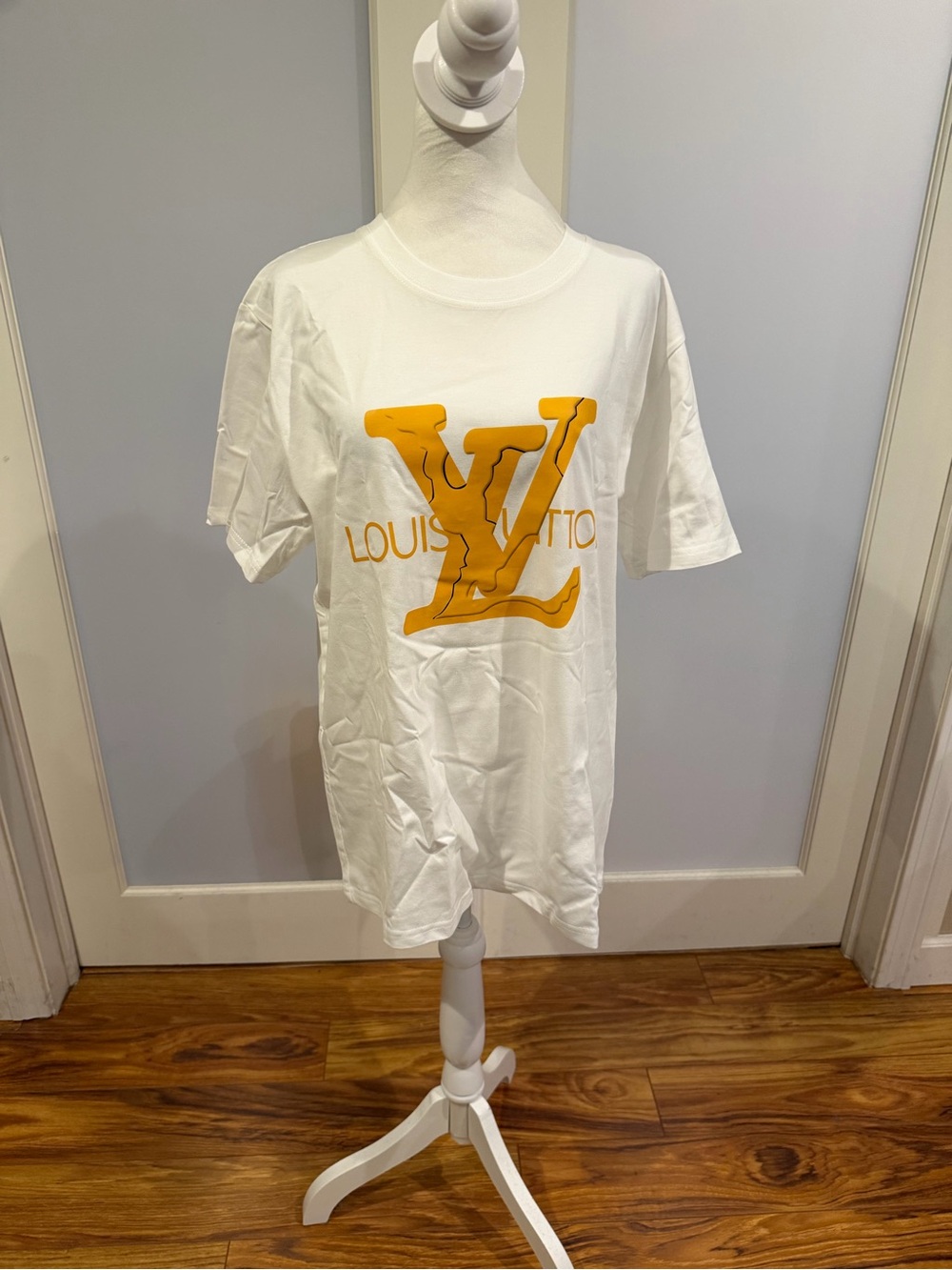Fashion White Tee with Bold Yellow Logo